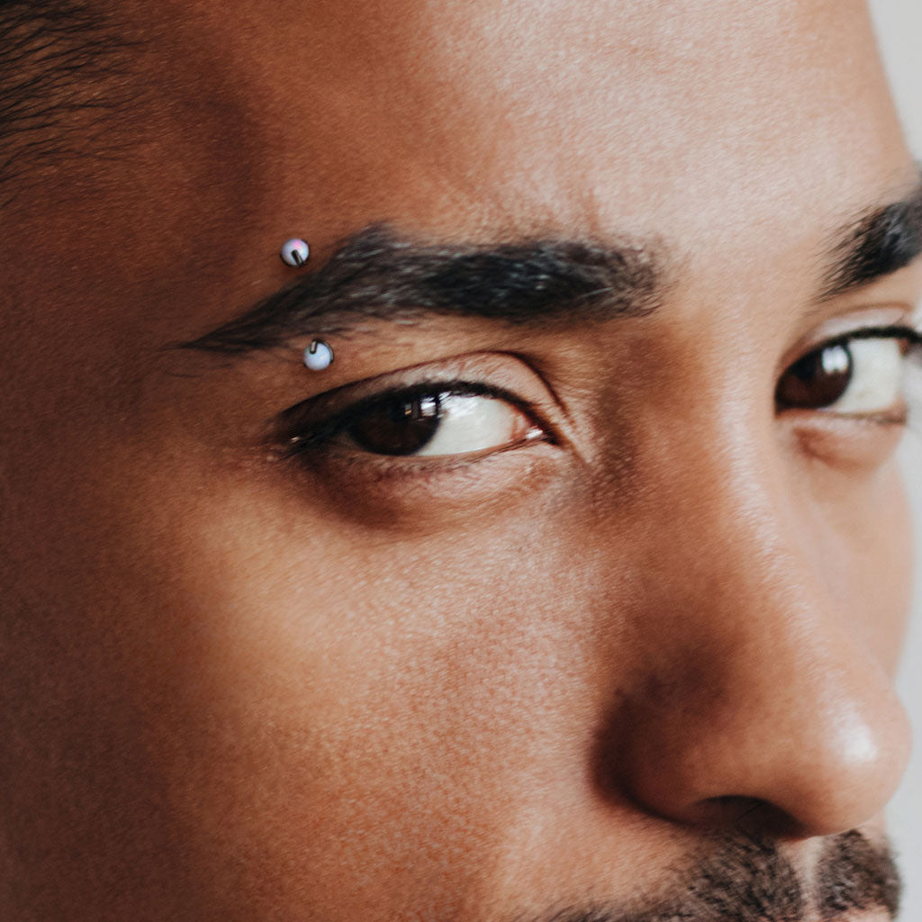 Curved Barbell Opal PVD Goudkleurig - Chirurgisch Staal