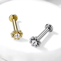 Zilverkleurige labret piercings met beads in zilver- of goudkleur van chirurgisch staal