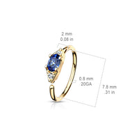 Klein goudkleurig neusringetje met blauwe steen – inclusief afmetingen