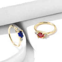 Neusringetjes met rode en blauwe zirconia